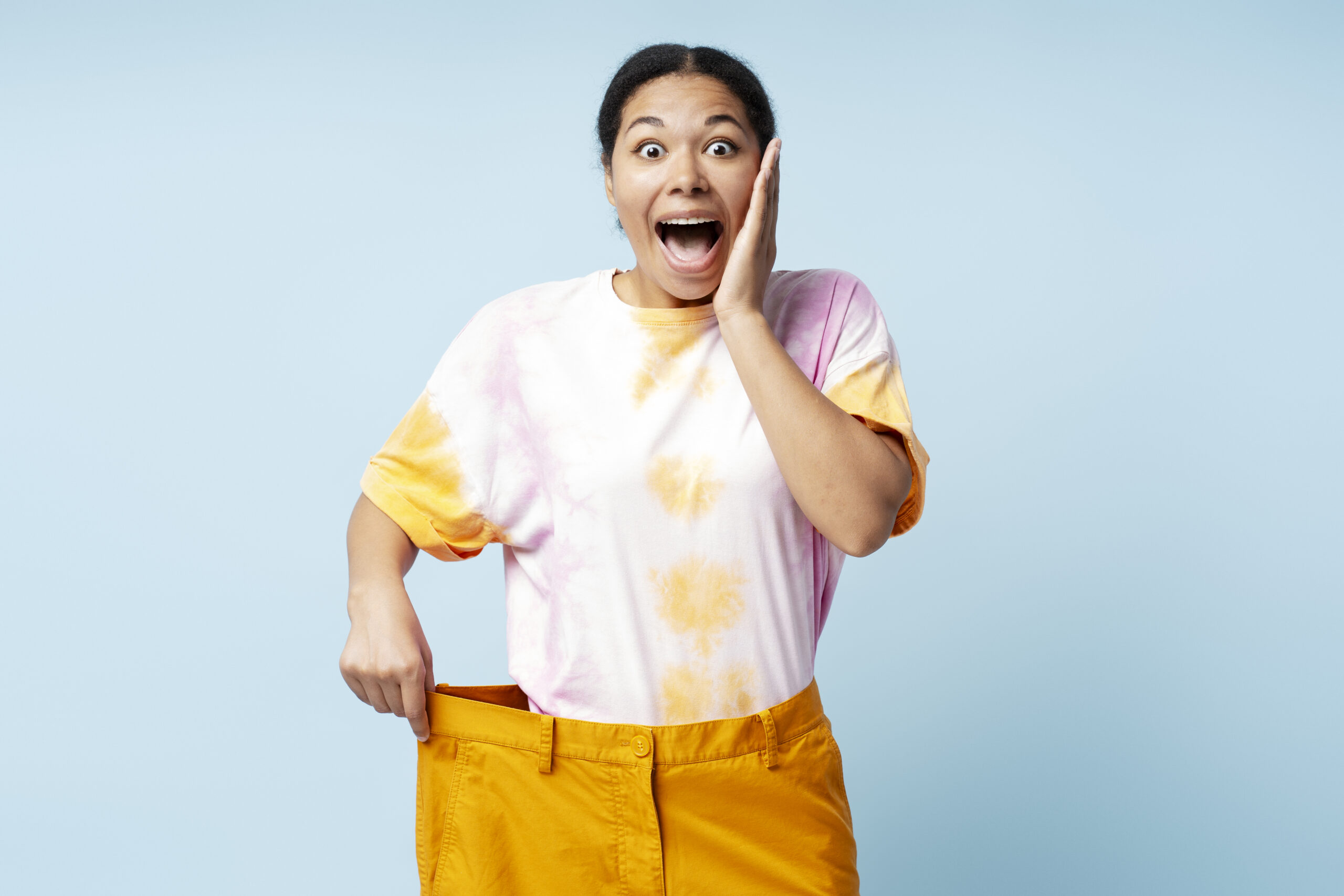 GLP-1 weight loss support UK in action - woman impressed by results